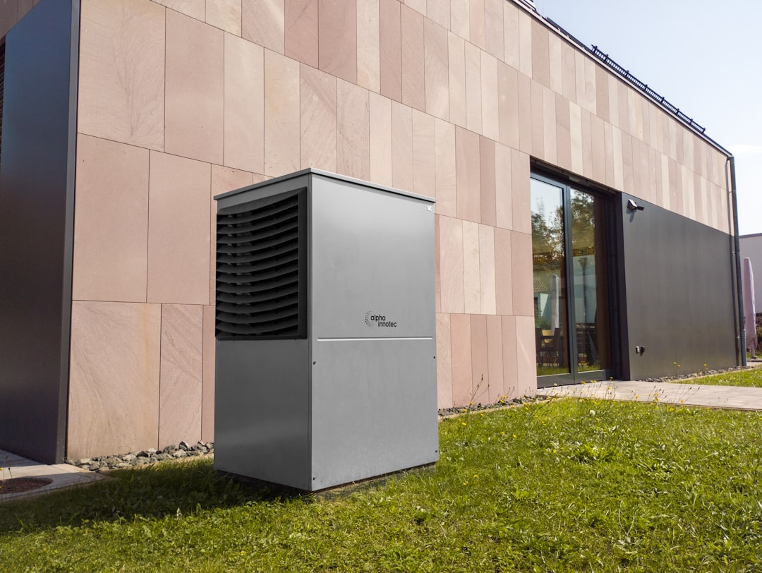 HVAC Blog 6 modern residential HVAC system outdoor unit installed beside a home - how ac refrigerant changes affect homeowners