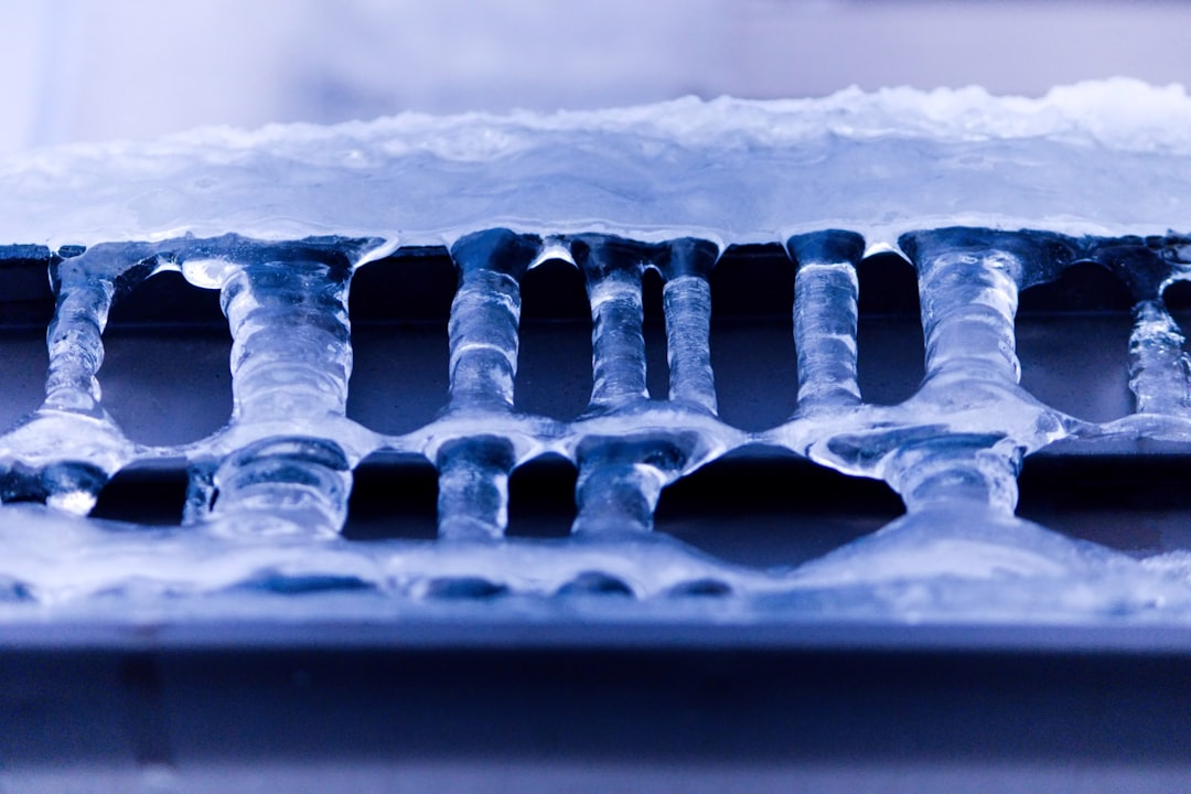 HVAC Blog 5 frozen AC evaporator coil with ice buildup on indoor unit during cooling season