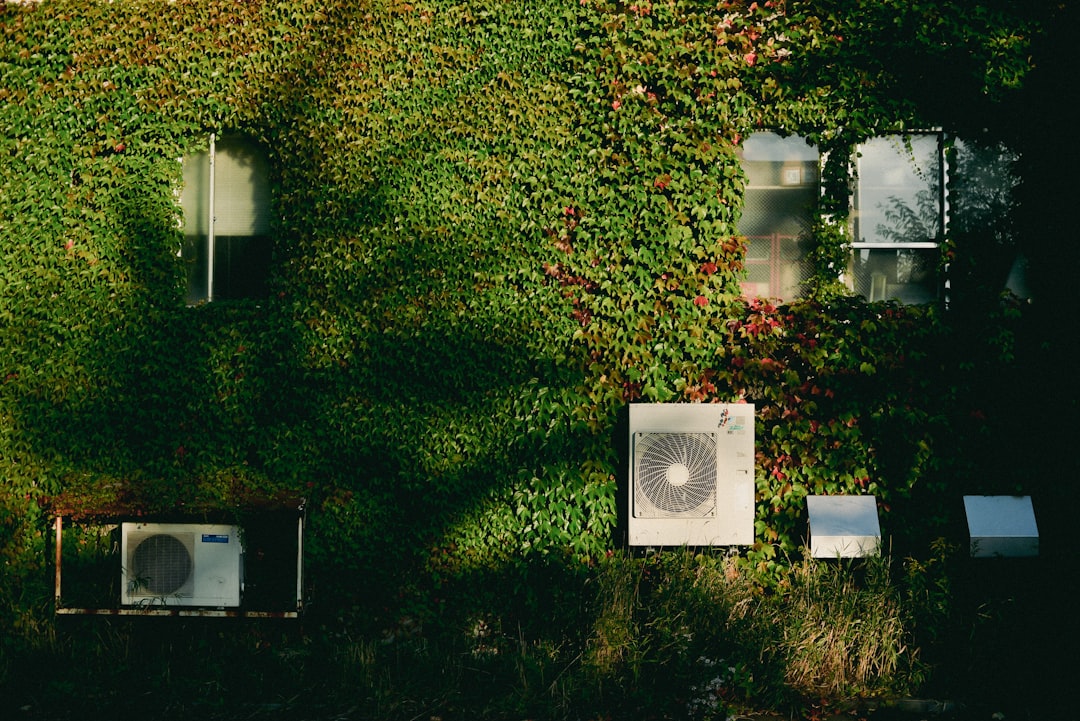 HVAC Blog 6 modern central air conditioning unit in a Northern New Jersey backyard - how ac maintenance extends your system lifespan